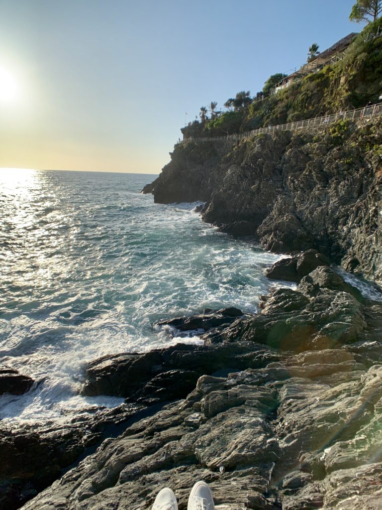 Gelato sitting over the cliff in Manarola, Cinque Terre, Italy