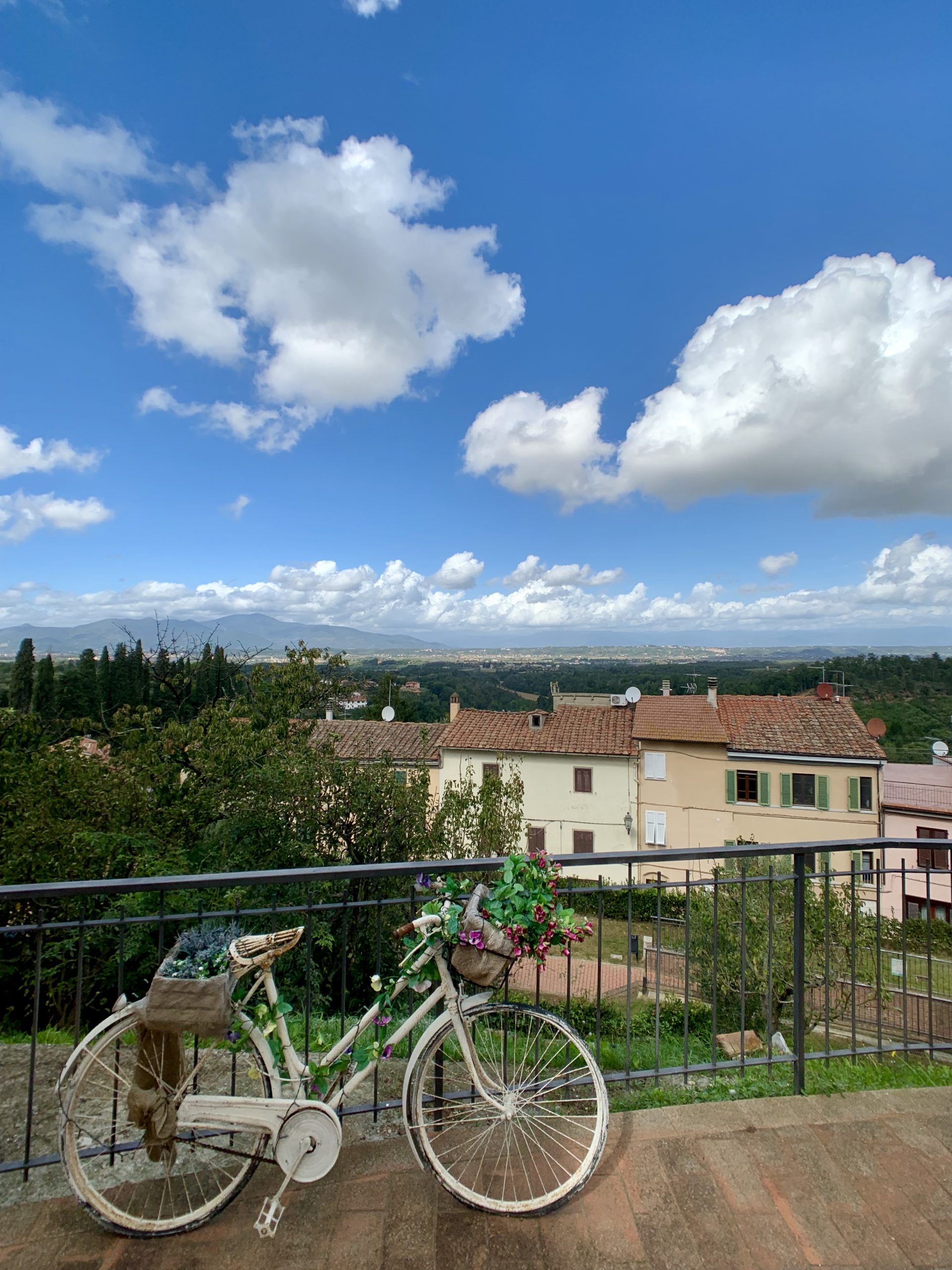 Behind Parrocchia di Santa Lucia, overlooking the Tuscan valley, Italy