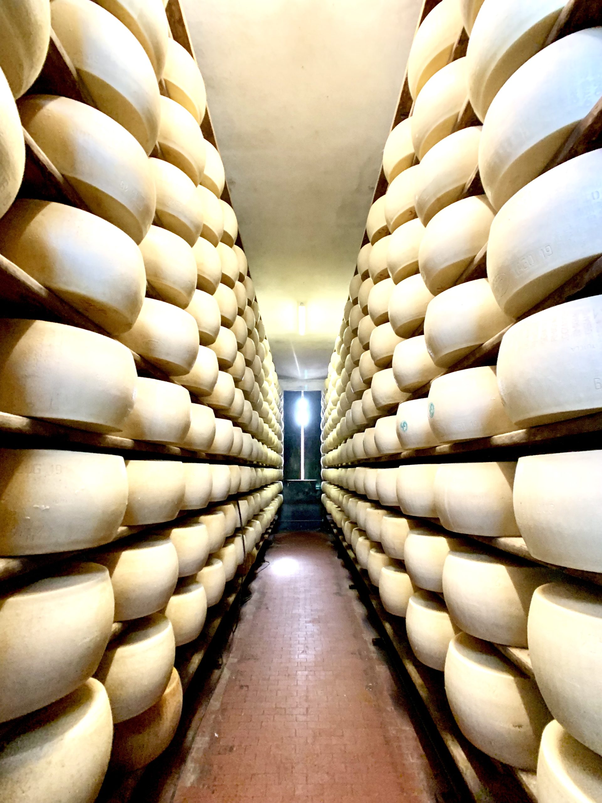 Cheese rounds at the Azienda Agricola Guareschi parmigiano-reggiano farm in Parma, Italy