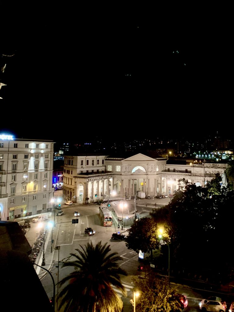 View from the Hotel Continental Genoa, overlooking the train station square at night